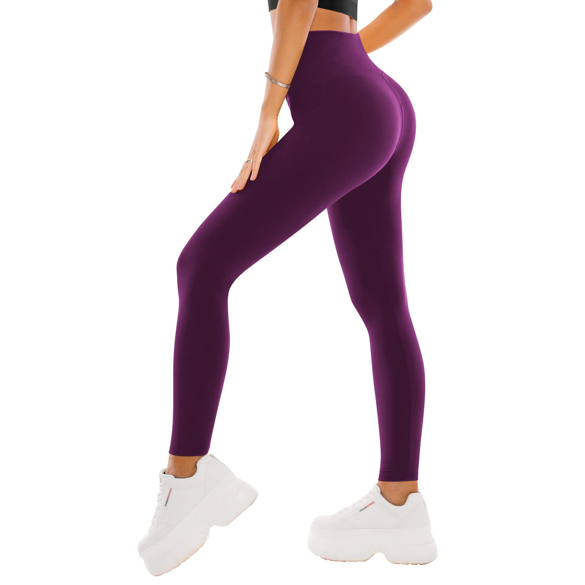Back view of high waisted leggings highlighting the wide supportive waistband and seamless seat
