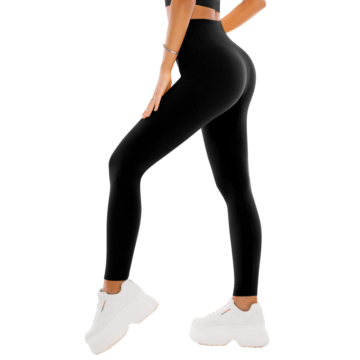 Pair of black capri leggings folded beside a full-length pair, showing both lengths