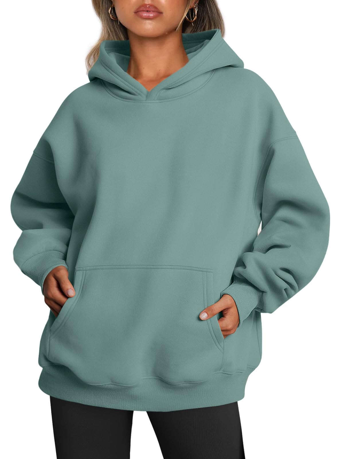 Oversized hoodie sleeve detail showing stitching and cuff finish