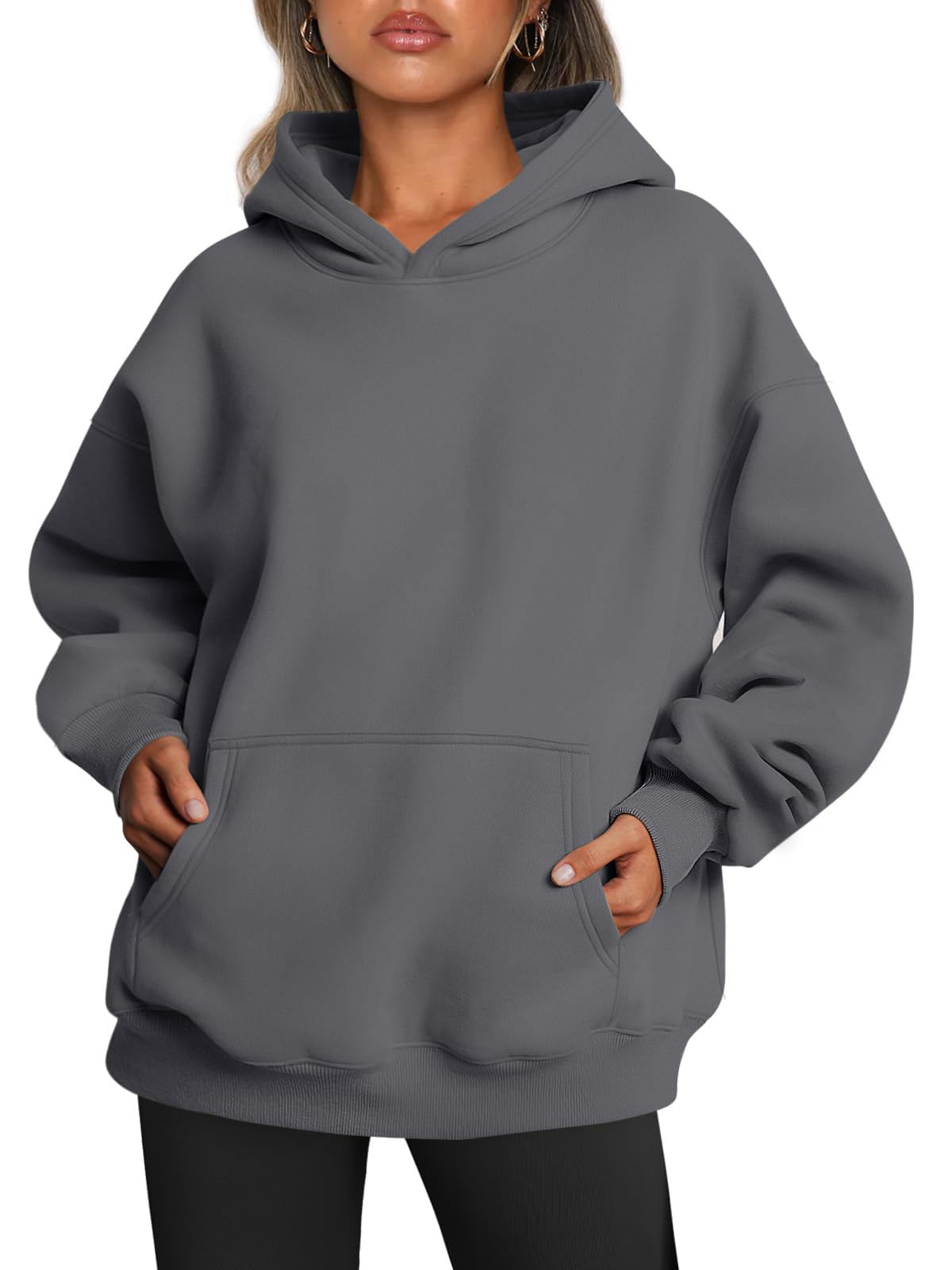 Detail of the front pocket opening and seam on the women's hoodie
