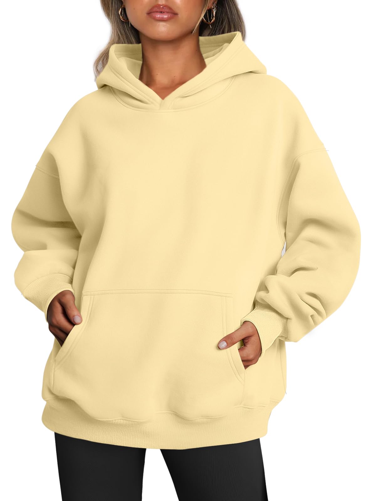 Back view of the women's oversized hoodie showing the plain rear panel and hem