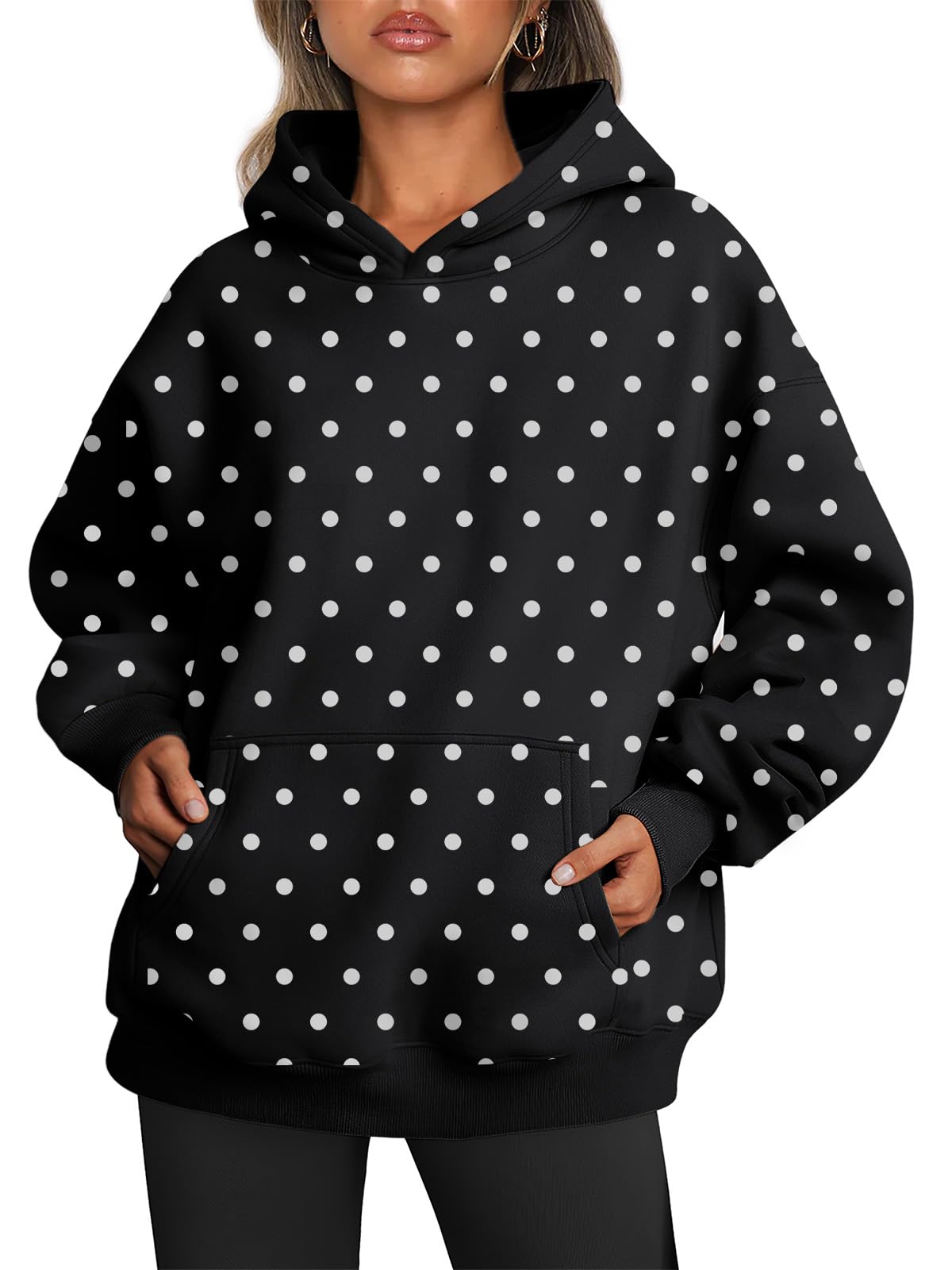 Detail of the shoulder seam and dropped-shoulder cut on the hoodie