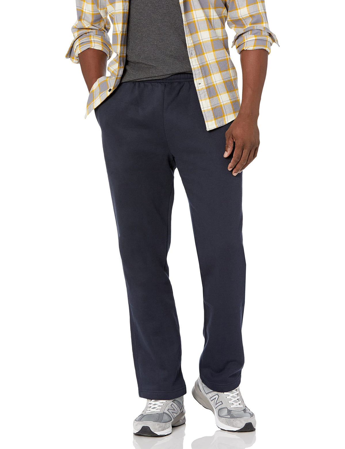Men's fleece open bottom sweatpants in black shown from behind with straight legs