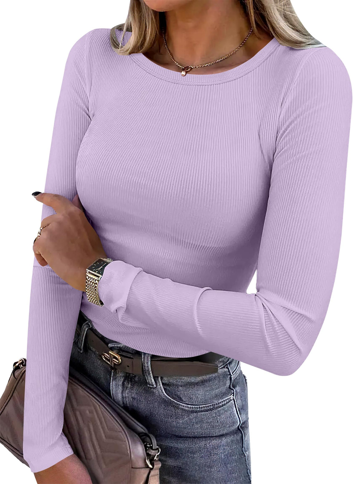 Ribbed long sleeve top paired with trousers for a smart casual look