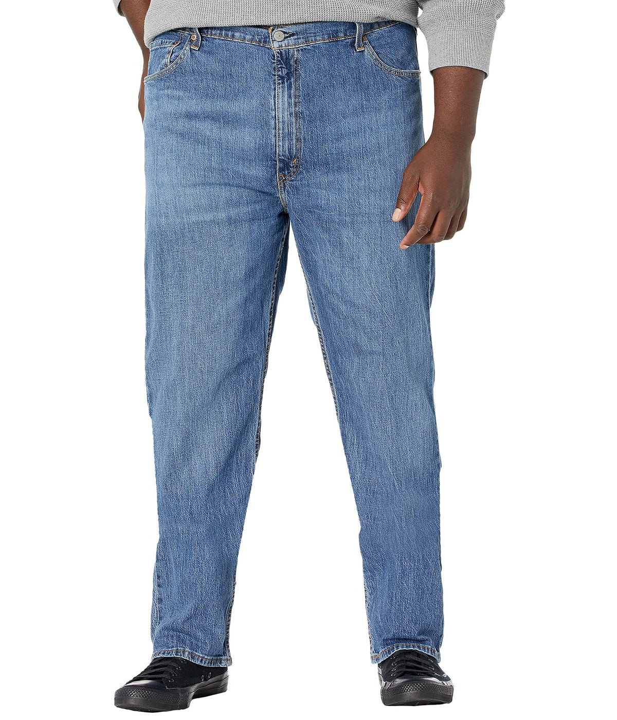 Men's 505 regular fit jeans waist close-up showing button and zip fly